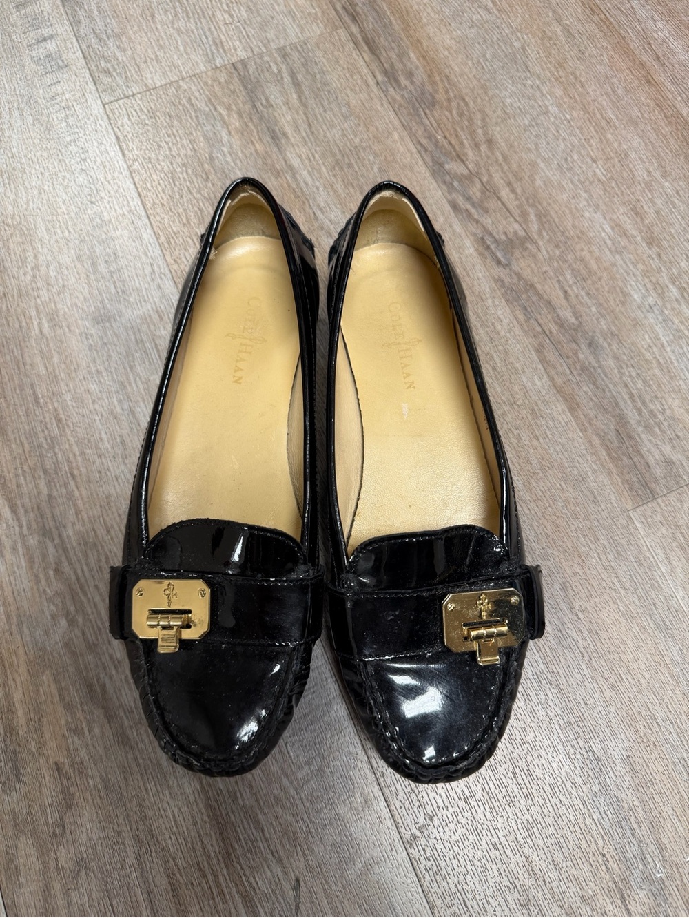 Cole Haan Black Patent Leather Loafers with Gold Lock Detail
